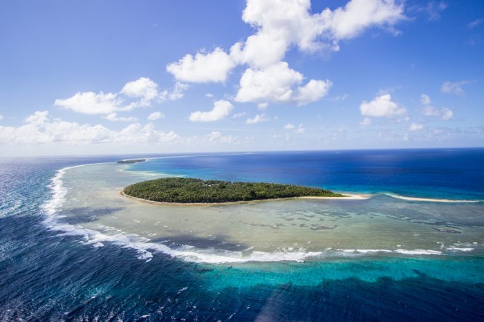 tropical beach scene from micronesia yap state ulithi atoll coral isolated island chain in the south pacific known for natural beauty and wildlife postcard tropical beaches and a very vibrant culture