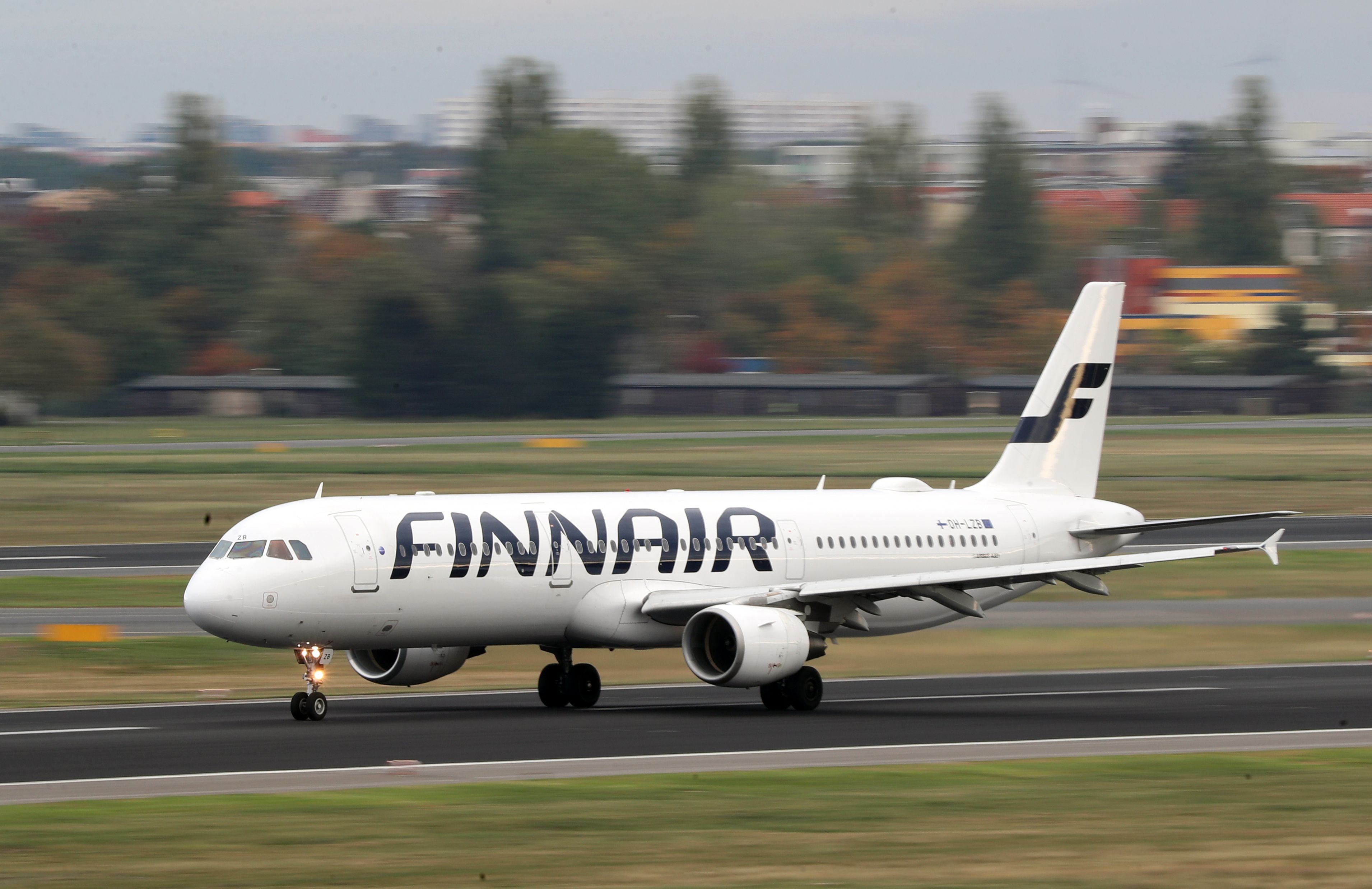 Mandatory Credit: Photo by FELIPE TRUEBA/EPA-EFE/Shutterstock (10451252a) An Finnair aircraft lands in Tegel airport, in Berlin, Germany, 20 October 2019. Finnair Airline is the biggest carrier in Finnland and has his headquarters in Helsinki airport. Finnair Airline in Berlin, Germany - 20 Oct 2019