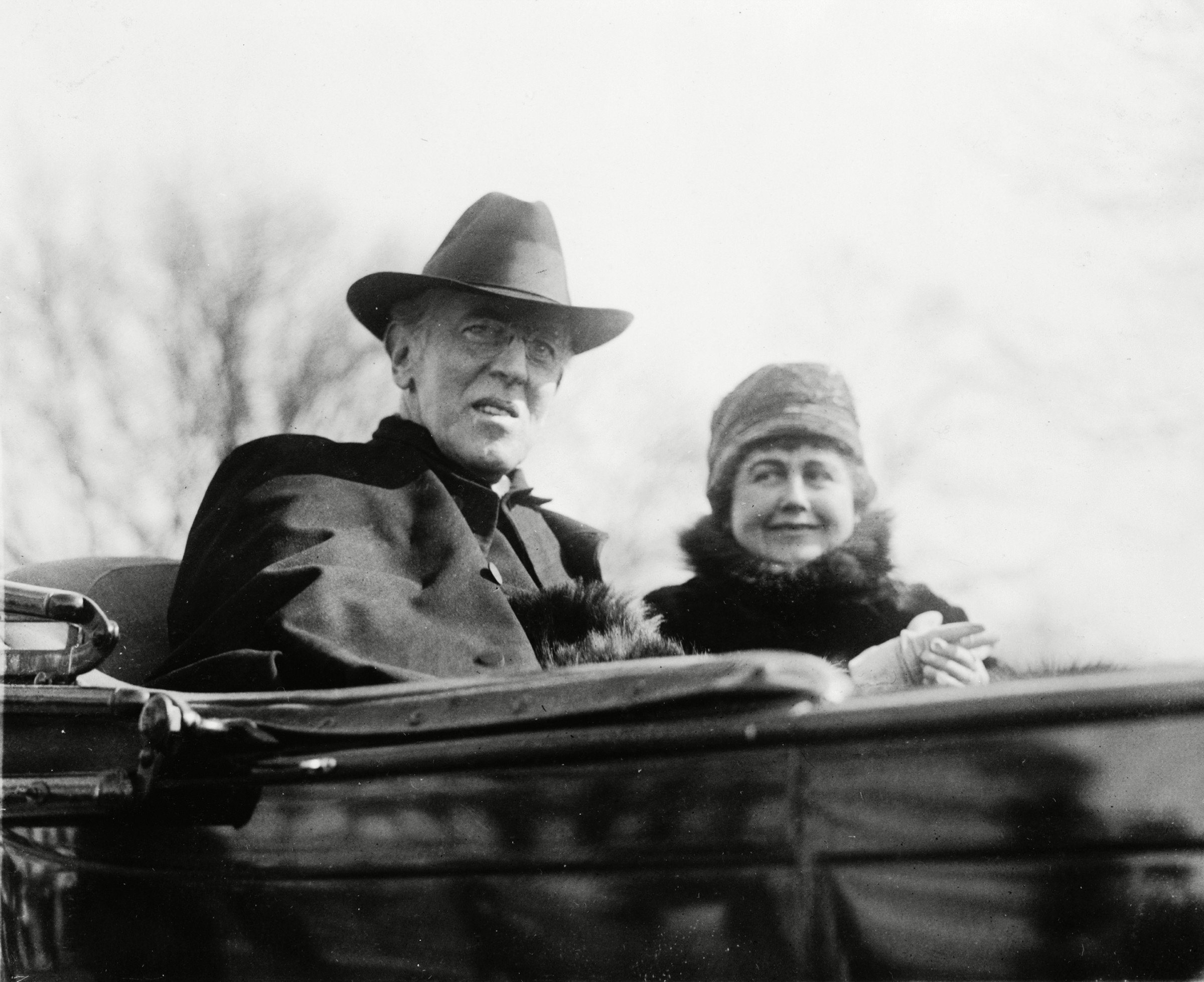 Mandatory Credit: Photo by Everett/Shutterstock (10274815a) Ex-President Woodrow Wilson (1856-1924) and his second wife, Edith Bolling Galt Wilson riding in an open carriage in Washington, DC in 1923. President Wilson shows the effects of a severe stroke he suffered in October 1919. Historical Collection