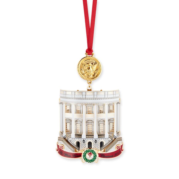 The White House Historical Association’s 2018 White House Christmas Ornament honors the 33rd president, Harry S. Truman. The ornament illustrates significant changes made to the White House during Truman’s administration, including his celebrated Truman Balcony, added in 1947–48 to the South Portico. The reverse side features his renovated Blue Room, which, like all the rooms of the house, was dismantled and rebuilt during the renovation of 1948–52. The Presidential Seal featured at the top of the ornament reflects the design as changed by Truman. Originally the American eagle looked toward its left talons, which hold a cluster of spears, weapons of war. Truman had the seal redesigned, turning the eagle’s head away from the spears to its right talons, which hold the olive branches of peace.