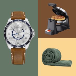 Watch showing time, waffle maker cooking a waffle, rolled green towel; displayed against green, brown, and yellow backgrounds.