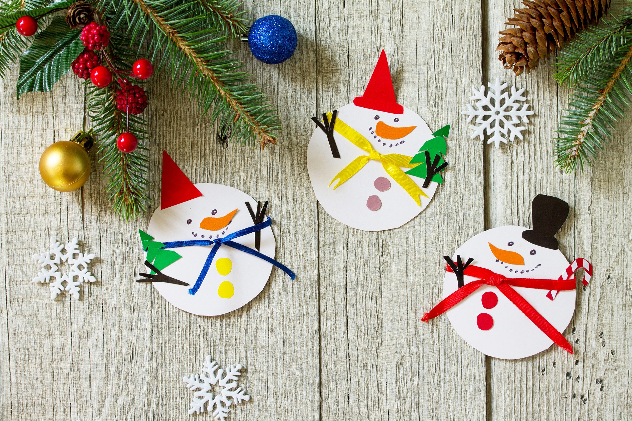Christmas snowman merry gift on wooden table