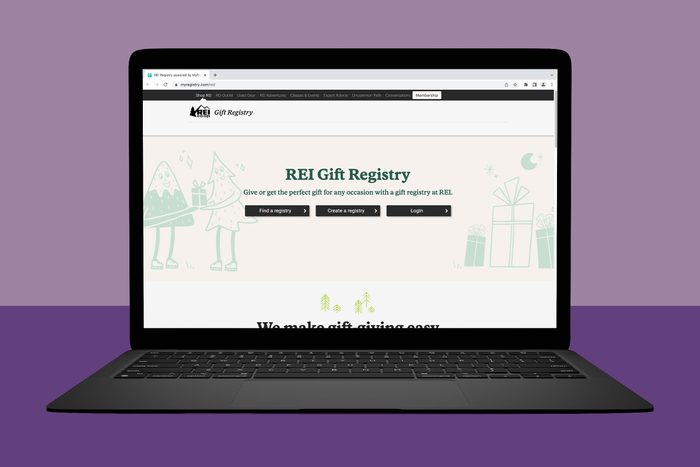 A laptop displays the REI Gift Registry webpage, offering options to find or create a registry, on a purple background.
