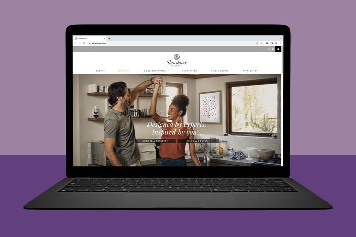 A laptop displays a couple dancing in a kitchen. Text reads: 