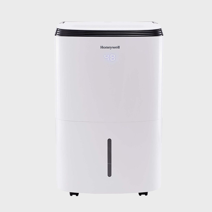 A white dehumidifier displays 