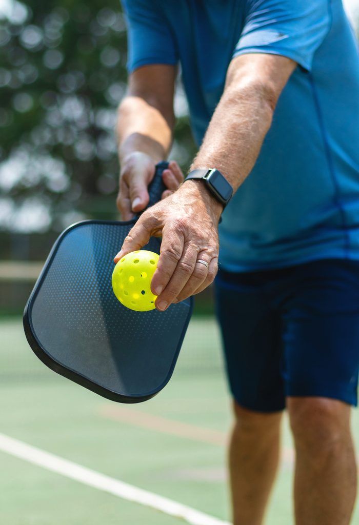 Mature Adult Male Playing Pickle Ball Photo Series