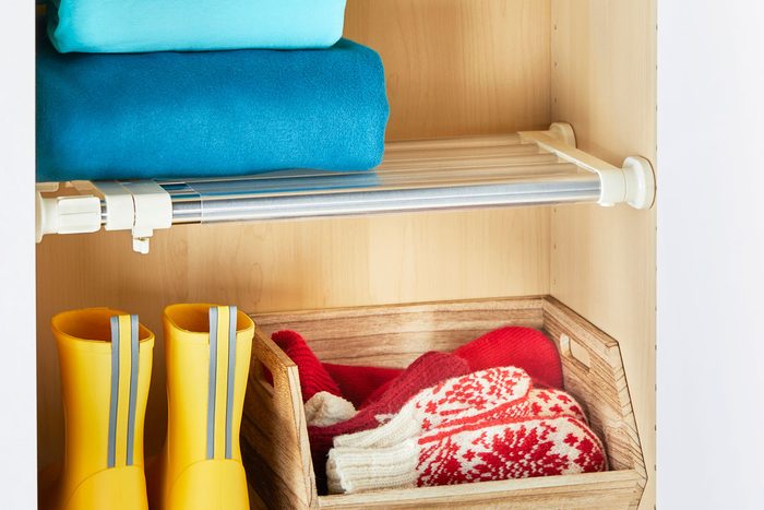 expandable shelf added into a small closet