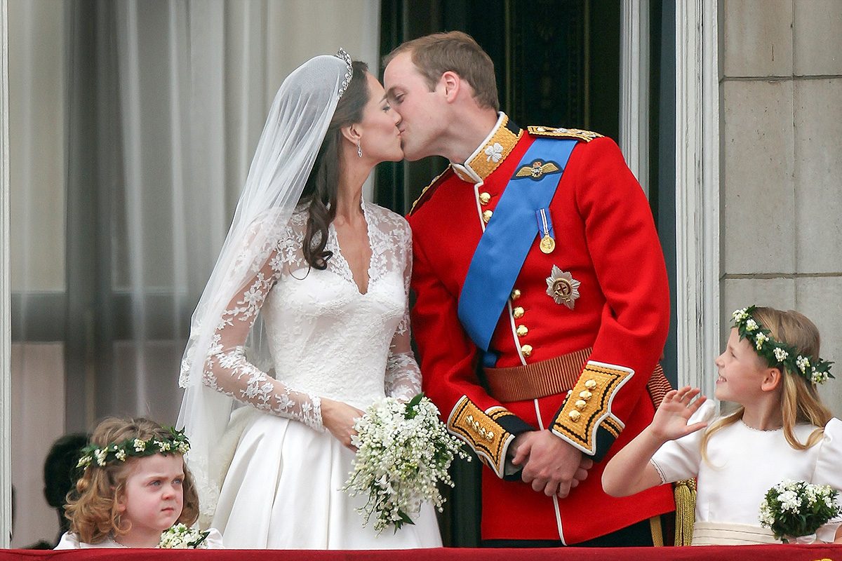 Prince William and Catherine kiss as Bridesmaids