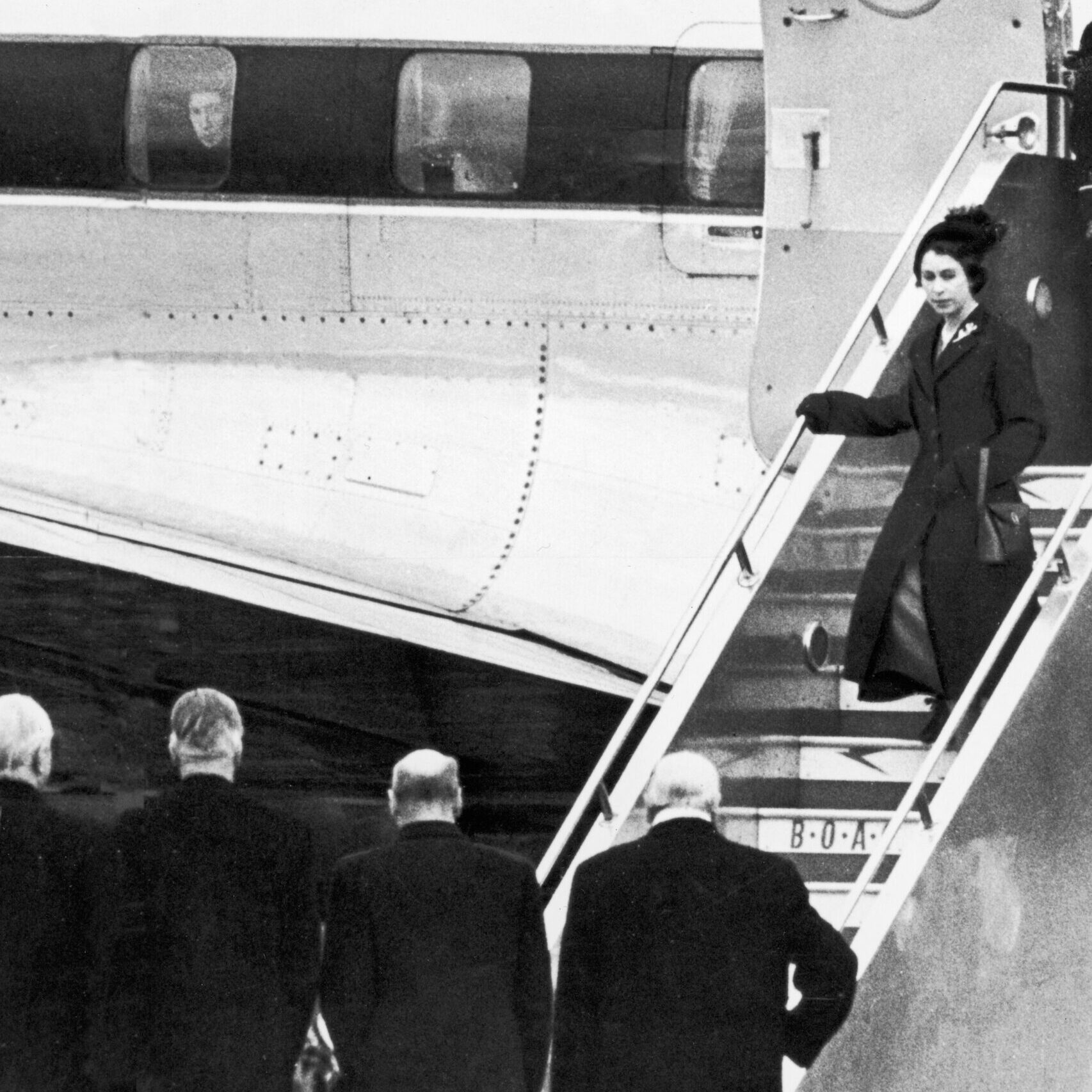 Queen Elizabeth Returns From Kenya off a plane in 1952